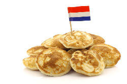 A Plate Of Dutch Pancakes With A Dutch Flag In
